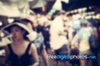 Blurred Crowd Of People In The Market Stock Photo