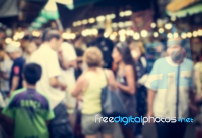 Blurred Crowd Of People In The Market Stock Photo