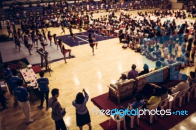 Blurred Crowd Of People Watching Performance In The Hall Stock Photo