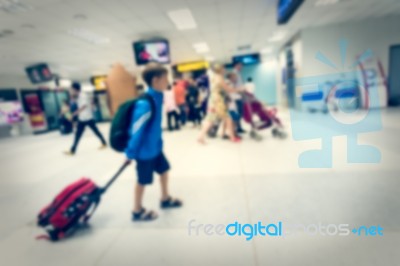 Blurred Crowd Of Tourist In The Airport Stock Photo