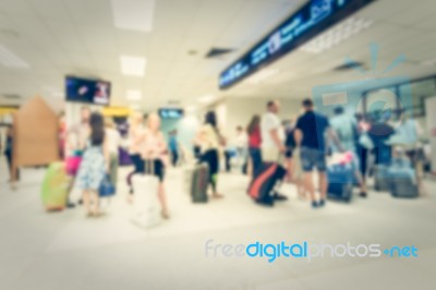 Blurred Crowd Of Tourist In The Airport Stock Photo