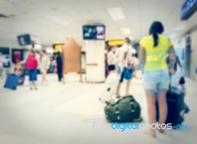 Blurred Crowd Of Tourist In The Airport Stock Photo