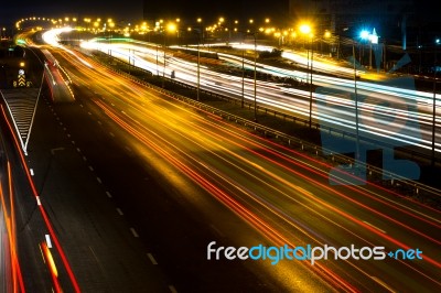 Blurred Darknight Traffic Light Trails On Street Stock Photo