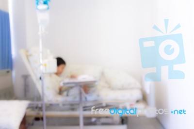 Blurred Image Of Patient With Drip In Hospital For Background Us… Stock Photo