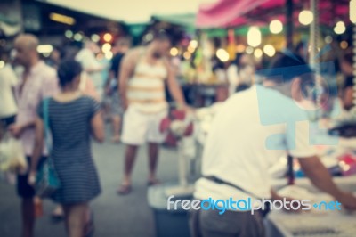 Blurred People Are In The Market Stock Photo