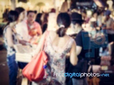 Blurred People Buying Food On The Street Stock Photo