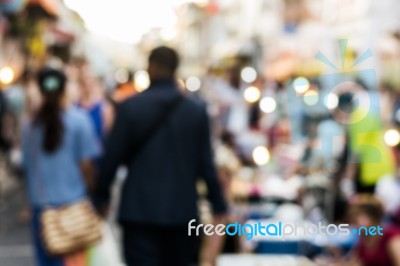 Blurred People Walking On The Street Stock Photo