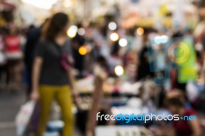 Blurred People Walking On The Street Stock Photo