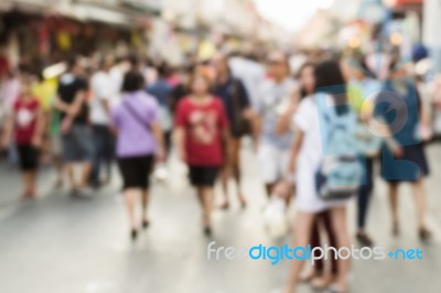 Blurred People Walking On The Street Stock Photo