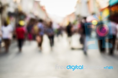 Blurred People Walking On The Street Stock Photo