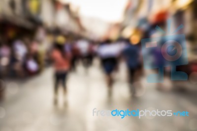 Blurred People Walking On The Street Stock Photo