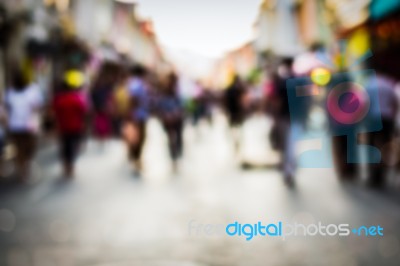 Blurred People Walking On The Street Stock Photo