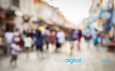 Blurred People Walking On The Street Stock Photo