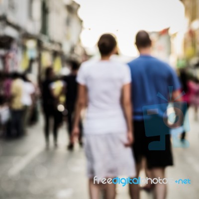 Blurred People Walking On The Street Stock Photo