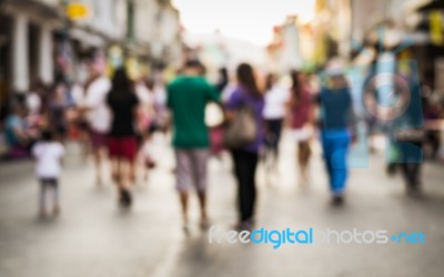 Blurred People Walking On The Street Stock Photo