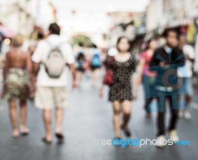 Blurred People Walking On The Street Stock Photo