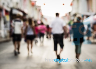 Blurred People Walking On The Street Stock Photo