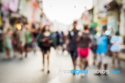 Blurred People Walking On The Street Stock Photo