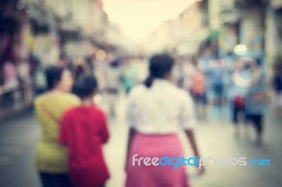 Blurred People Walking On The Street Of Old Town Stock Photo