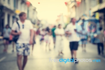 Blurred People Walking On The Street Of Old Town Stock Photo