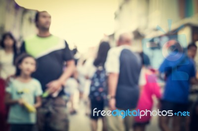 Blurred People Walking On The Street Of Old Town Stock Photo