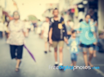 Blurred People Walking On The Street Of Old Town Stock Photo