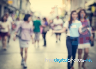 Blurred People Walking On The Street Of Old Town Stock Photo