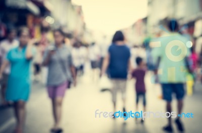 Blurred People Walking On The Street Of Old Town Stock Photo