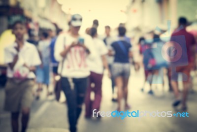 Blurred People Walking On The Street Of Old Town Stock Photo