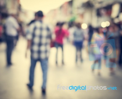 Blurred People Walking On The Street Of Old Town Stock Photo