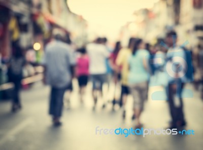 Blurred People Walking On The Street Of Old Town Stock Photo