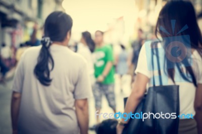 Blurred People Walking On The Street Of Old Town Stock Photo