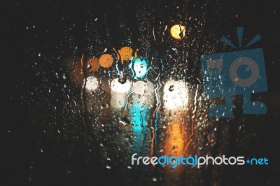 Blurred Rain Background, View Through Wet Car Window Stock Photo