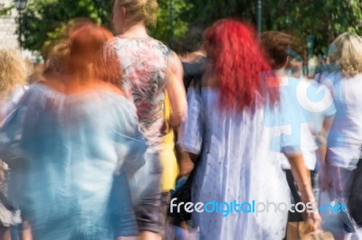 Blurry People Walking In The Street Stock Photo