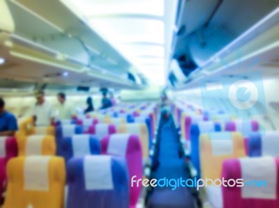 Blury Shot  Inside Wide Body  Airplane With Passenger Stock Photo