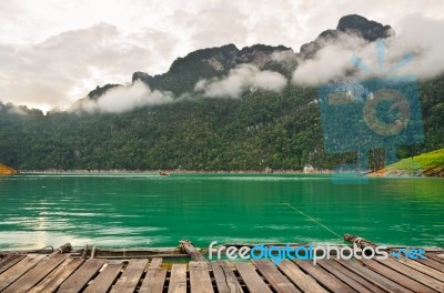 Boardwalk Front Bungalow On Green Lake Stock Photo