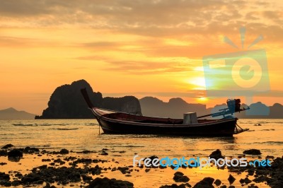 Boat And Sunrise Stock Photo