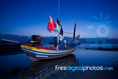 Boat At Dusk Stock Photo