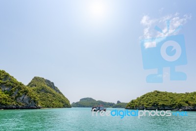 Boat For Travel Anchored In The Sea Stock Photo