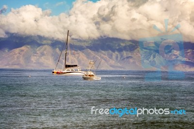 Boats And The Coastline In Maui Island In Hawaii Stock Photo