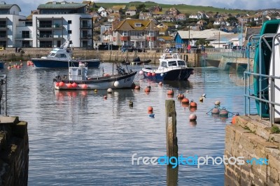 Boats In The Harbour At Lyme Regis Stock Photo