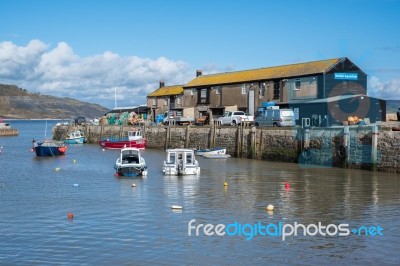 Boats In The Harbour At Lyme Regis Stock Photo