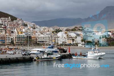 Boats Moored In Los Christianos Harbour Stock Photo