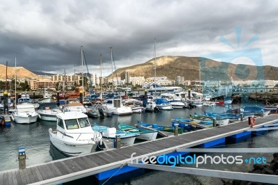 Boats Moored In Los Christianos Harbour Stock Photo