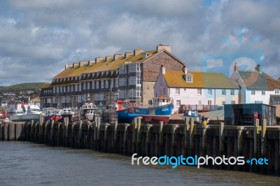 Boats On The Quayside At Lyme Regis Stock Photo