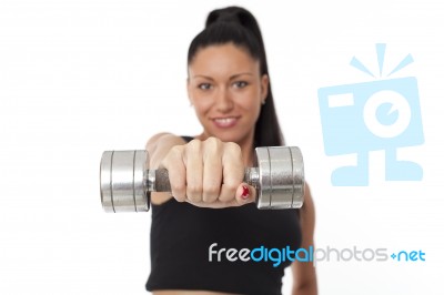 Body Of Slim Female In Activewear Doing Exercise With Dumbbells Stock Photo