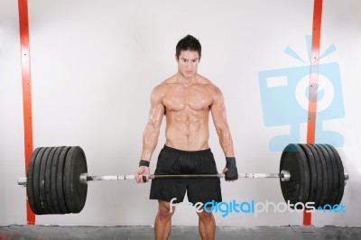 Bodybuilder Training In A Gym Stock Photo