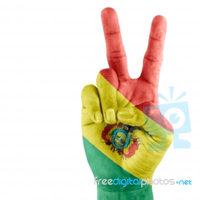 Bolivia State Flag On Victory Hand Stock Photo