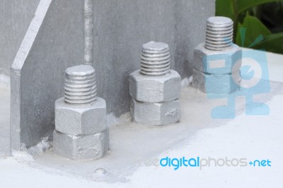 Bolt And Nut Of Base Metal Pillar Focus Near Bolt Stock Photo