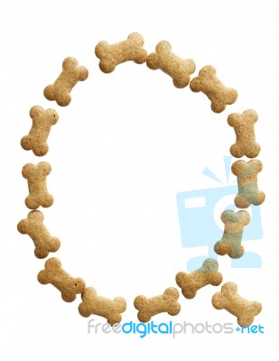 Bone Shape Dog Food Letter Q Stock Photo